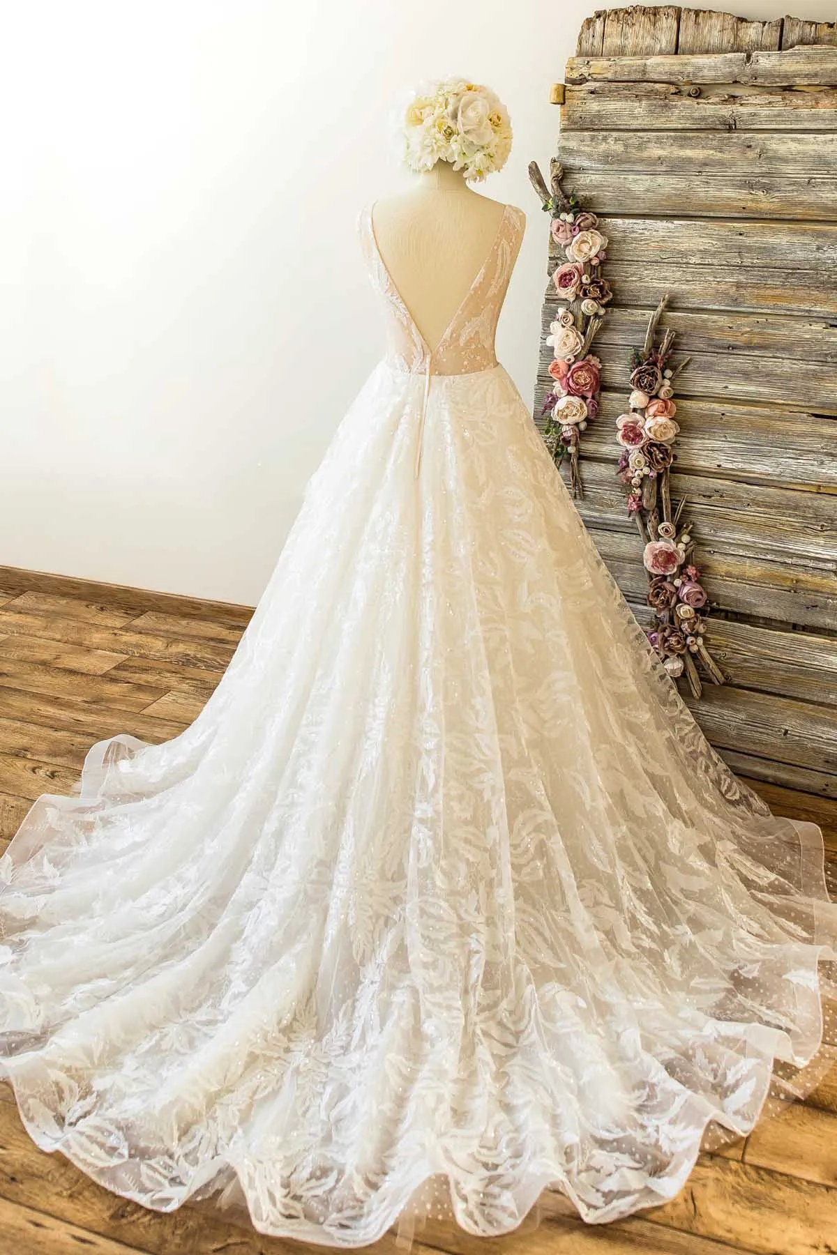 Designer Feathered Lace Plunging Neck Wedding Ball Gown