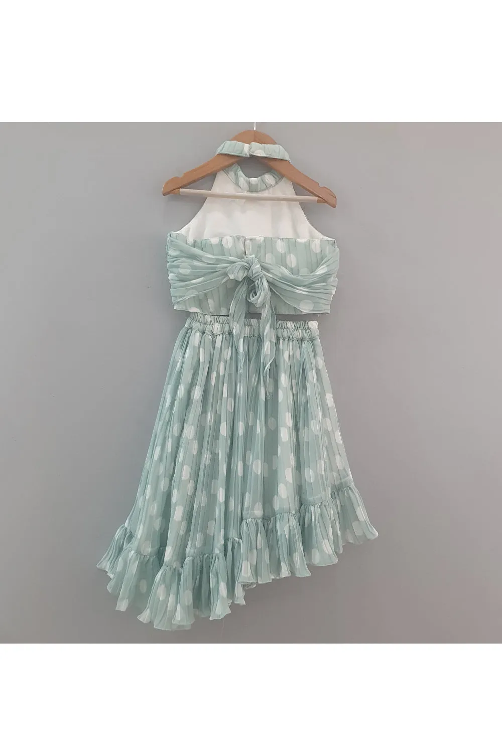 Pastel green pleated halter top with asymmetrical skirt